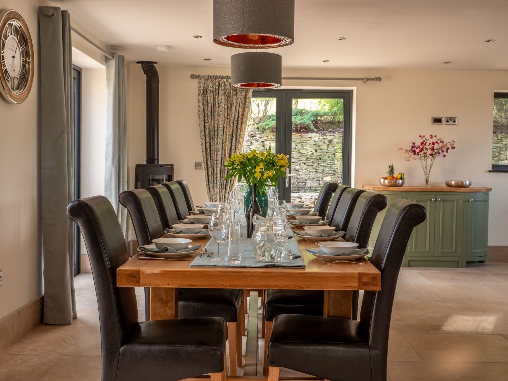 Dining table in kitchen with seating for 12